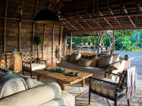 There is a dining, lounge, and bar area overlooking the baï, as well as a star deck
