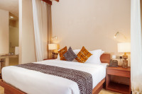 A view inside the room showing the bed and other room fittings