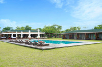 Exterior view featuring the swimming pool area