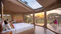 Witness the sun rising over the horizon from the comfort of your tent