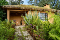 Cottage verandah with views of Sabyinyo Volcano