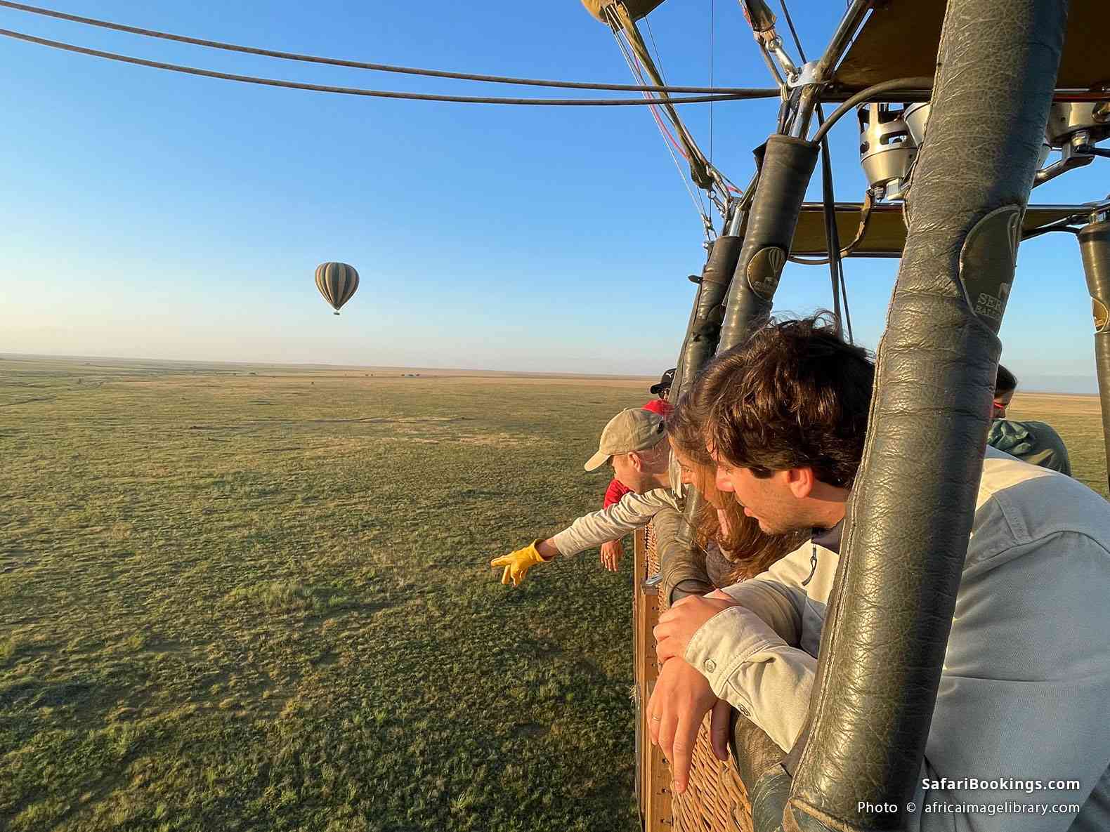 People enjoying a hot-air balloon safari in Serengeti