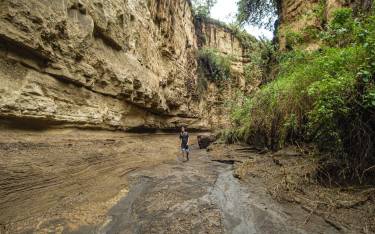 Person walking in a canyon