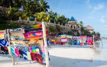 Fabrics for sale on the beach