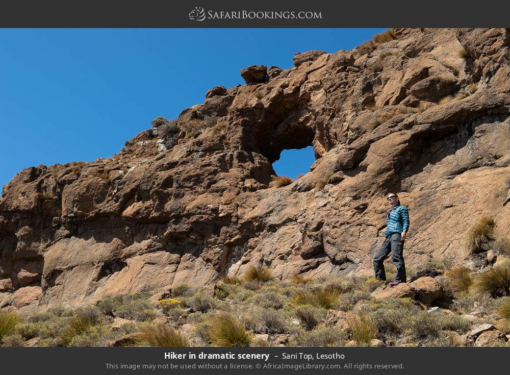 Hiker in dramatic scenery in Sani Top, Lesotho