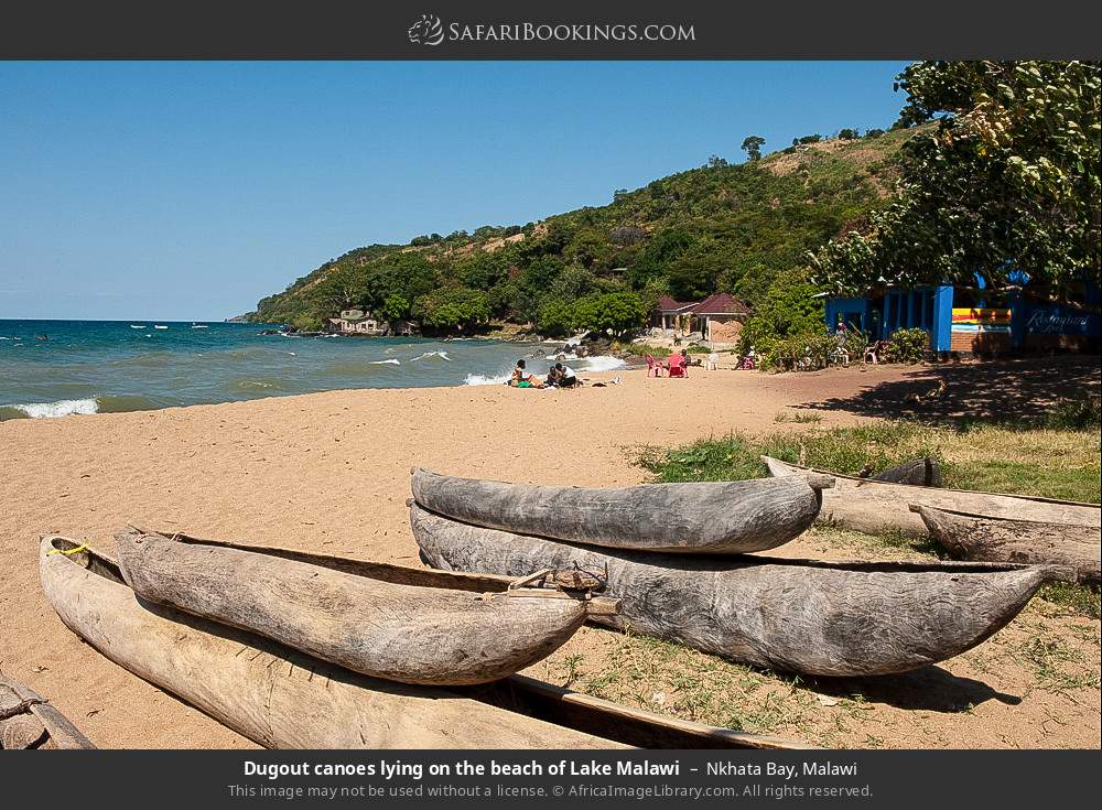 Dugout canoes lying on the beach of Lake Malawi in Nkhata Bay, Malawi