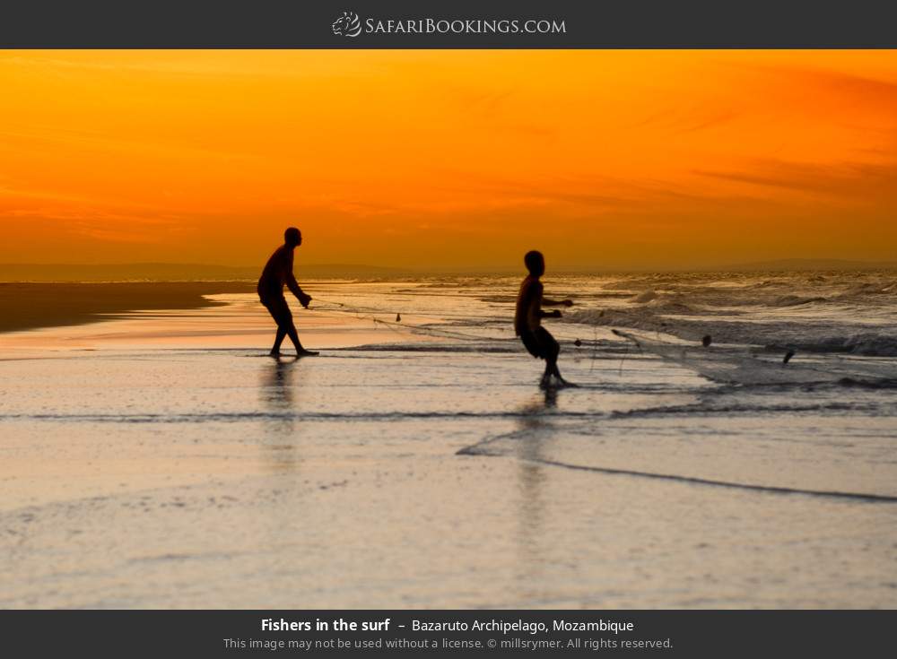 Fishers in the surf in the Bazaruto Archipelago in Bazaruto Archipelago, Mozambique