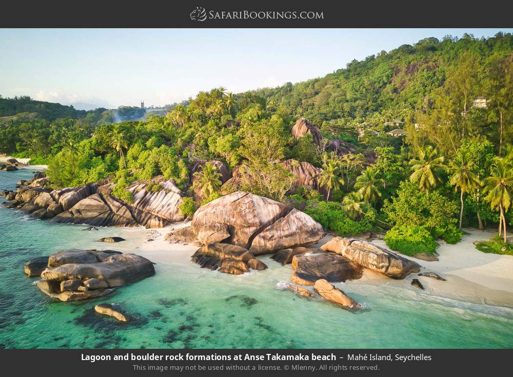 Lagoon and boulder rock formations at Anse Takamaka in Mahé Island, Seychelles