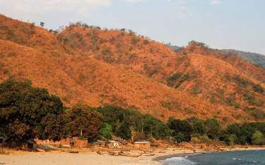 Fishing village below Livingstone Mountains, Lake Nyasa, Matema Beach