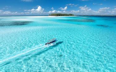 Boat approaching Mnemba Island