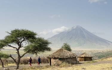 Maasai village at the base of Ol Doinyo Lengai, active volcano near Lake Natron