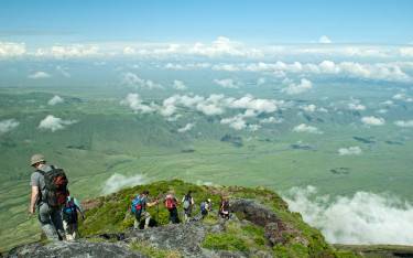 People hiking down the mountain