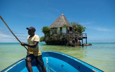 Transfer to The Rock Restaurant by boat
